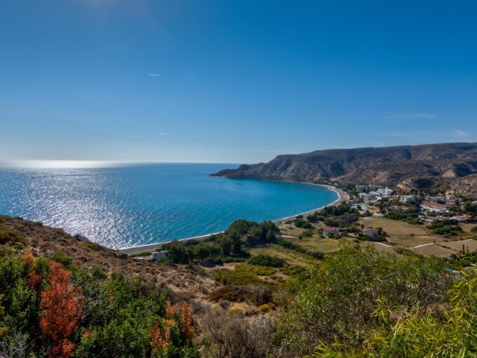 Photo of Pissouri Bay from Melanda heights, showing farm land then the bay enclosed with Cape aspro, with the Mediterranean Sea